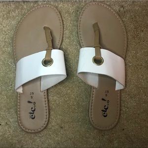 White and Tan Flip Flop Sandals